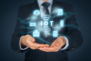 Man Holding IoT In His Hands