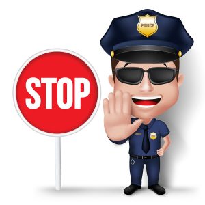 Police Officer And Stop Sign